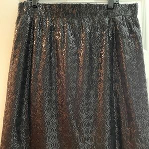 Knee Length Calvin Klein skirt.